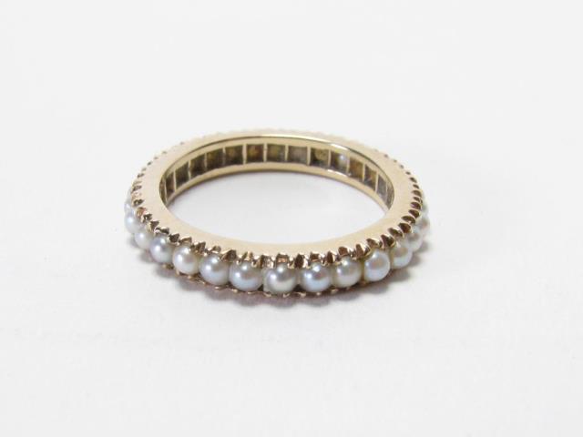 Appraisal: A vintage K yellow gold cultured pearl eternity band size