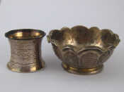 Appraisal: A small Russian silver bowl with lobed rim and engraved