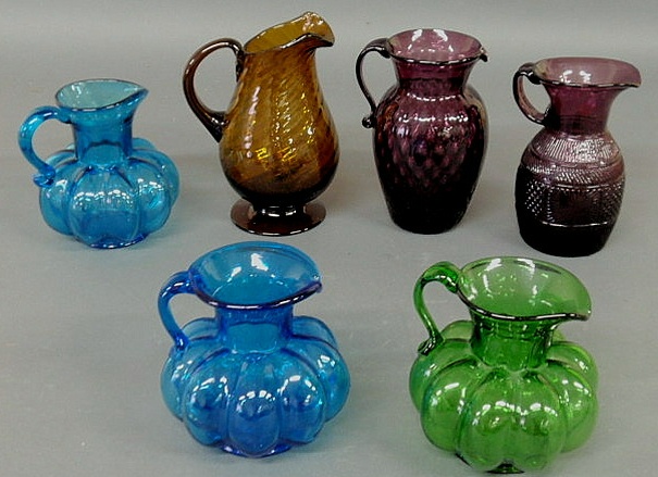 Appraisal: Six glass pitchers some Clevenger- two amethyst h one blown