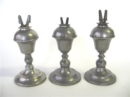 Appraisal: Three pewter champhene burner lamps capen molineux and smith and