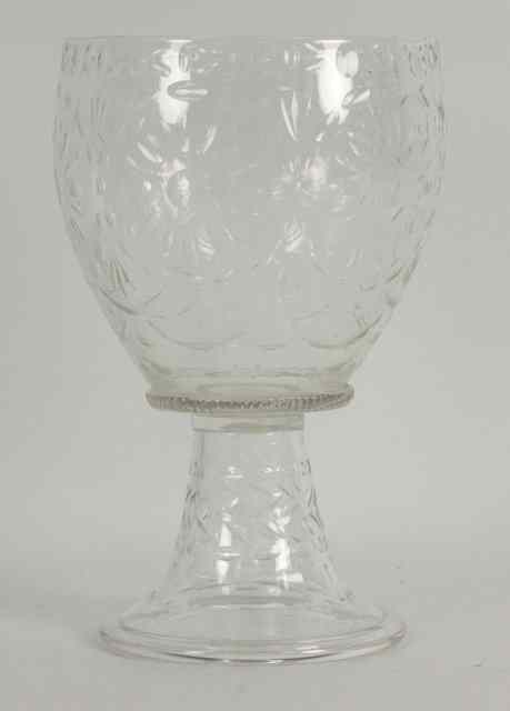 Appraisal: A large goblet cut flowerheads on a hollow tapered base