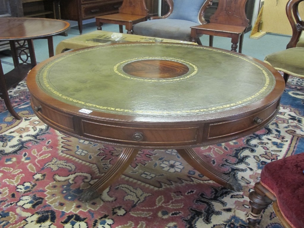 Appraisal: Reproduction swivel drum table with leather top