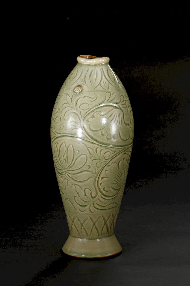 Appraisal: Rare Yaozhou Celadon Carved 'Fish Form' Vase Finely potted as