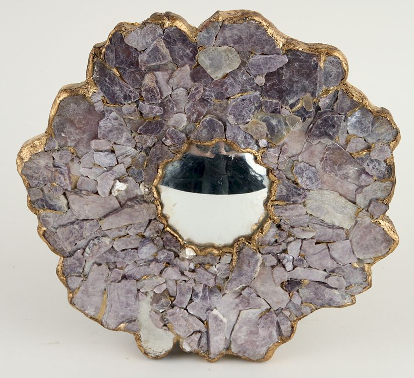 Appraisal: PETITE MIRROR FORM OF STYLIZED FLOWER CONVEX A petite mirror