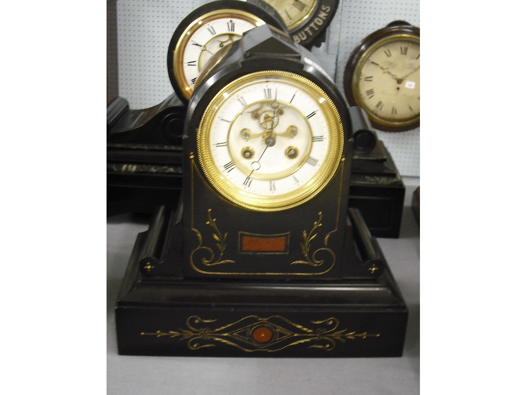 Appraisal: Black slate and red marble panel two train mantel clock