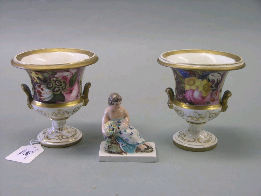 Appraisal: A pair of early th century English porcelain Campana vases