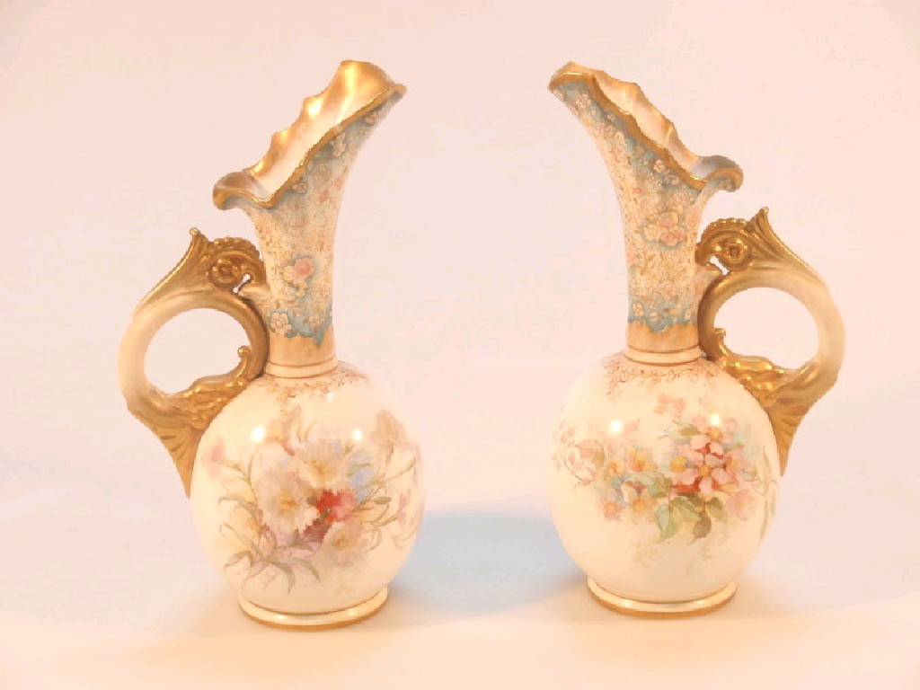 Appraisal: A pair of Doulton Burslem ewers of ovoid form with