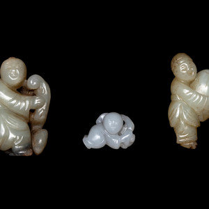 Appraisal: Three Chinese Celadon and White Jade Carved Figures of Boys