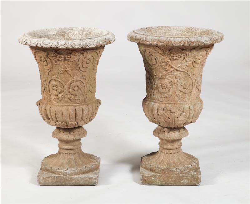 Appraisal: PAIR OF NEOCLASSICAL STYLE CAST-STONE GARDEN URNS Each of campana