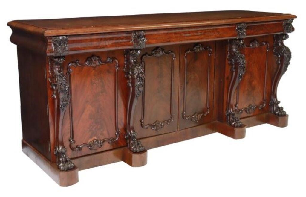 Appraisal: English Victorian carved mahogany sideboard th c having stepped rectangular