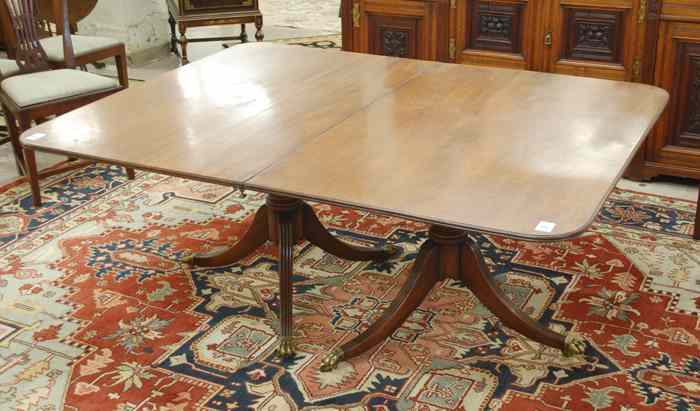 Appraisal: GEORGE III MAHOGANY TWO-PART DINING TABLE WITH LEAF English early