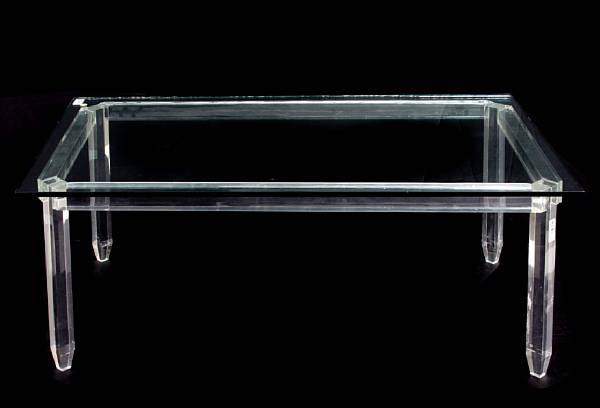 Appraisal: A contemporary acrylic and glass coffee table height in width