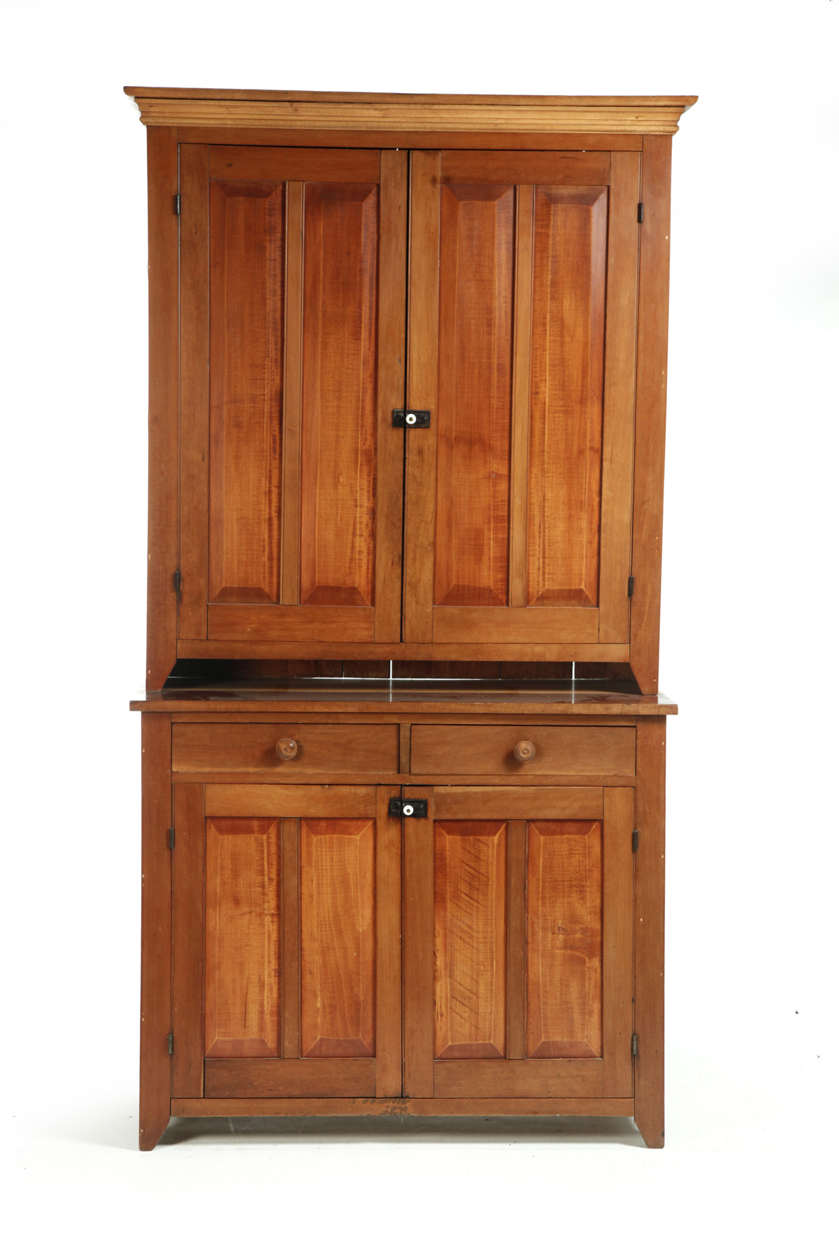 Appraisal: TWO-PIECE STEPBACK CUPBOARD American nd half- th century cherry and