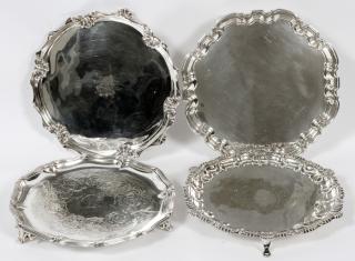 Appraisal: ANTIQUE SILVER ANTIQUE SILVER-PLATE FOOTED TRAYS Three of the trays