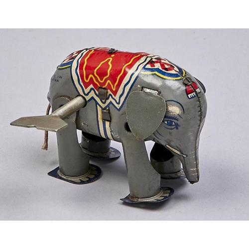 Appraisal: A Japanese lithographed tinplate clockwork elephant toy c More Information