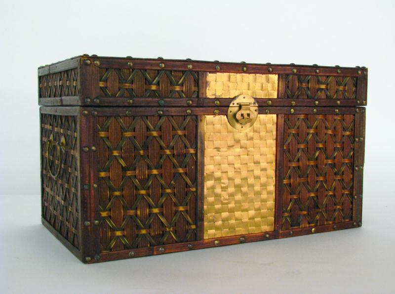 Appraisal: Decorator Handled Small Trunk with woven reed exterior and brass