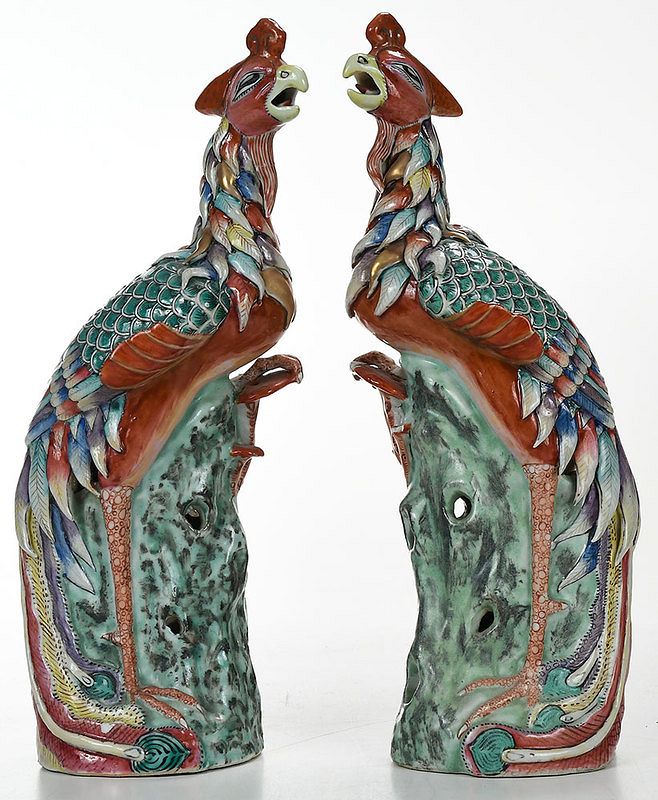 Appraisal: Pair Chinese Export Enameled Porcelain Phoenixes each perched on a