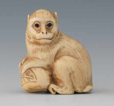 Appraisal: A Carved Ivory Netsuke of a Monkey Depicting a seated