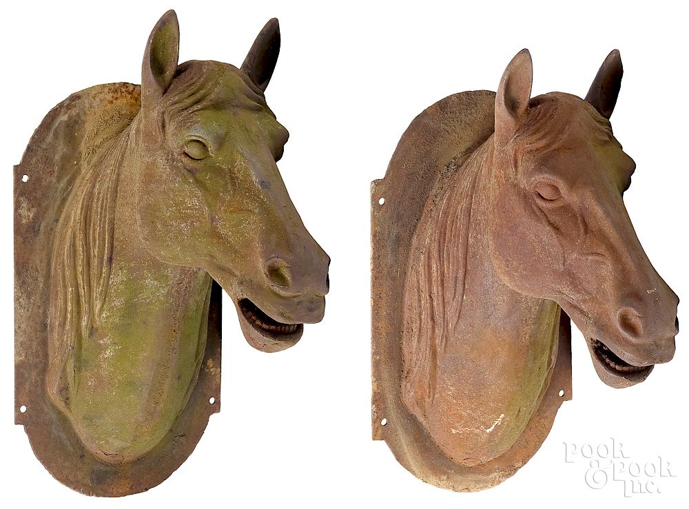 Appraisal: Pair of cast iron horse head plaques Exclusive on Bidsquare