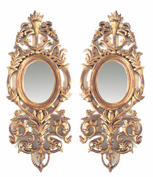 Appraisal: A pair of giltwood oval Italian mirrors height in width