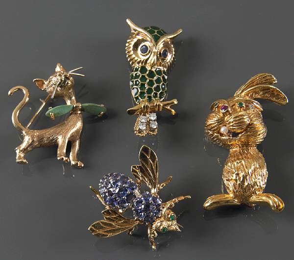 Appraisal: A collection of four gem-set and gold animal brooches comprising