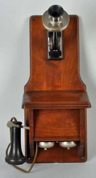 Appraisal: Western Electric A Fiddleback Circa Walnut Seven-digit transmitter common battery