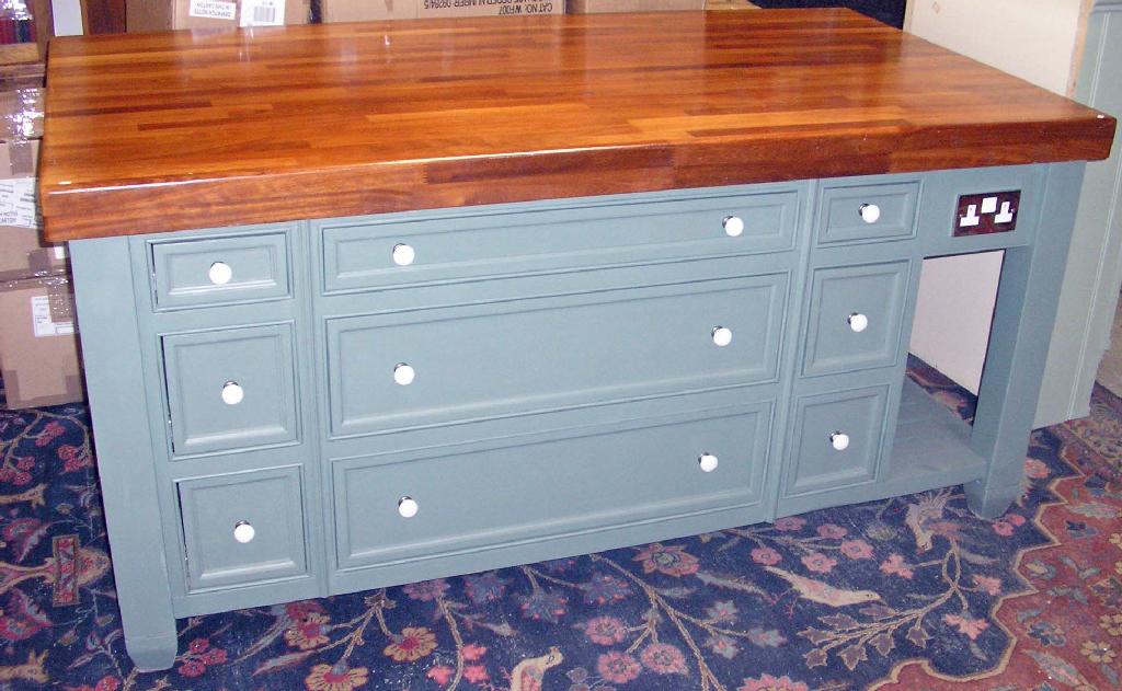 Appraisal: A bespoke kitchen island unit with teak top and green