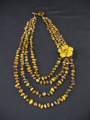 Appraisal: Tigereye Necklace four strand on natural nuggets carved rose longer