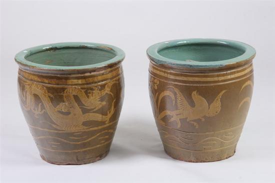 Appraisal: PAIR CHINESE OCHRE BROWN AND CELADON STONEWARE CONTAINERS