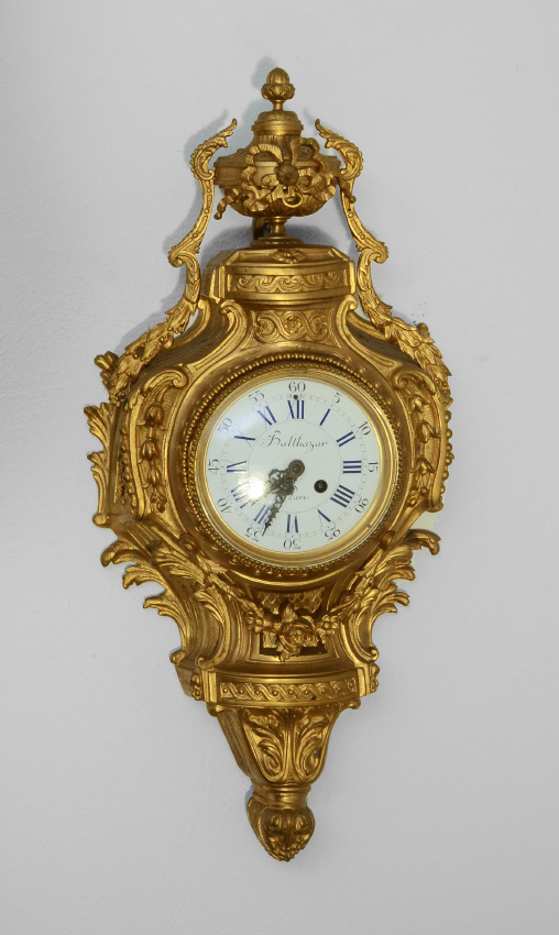 Appraisal: BALTHAZAR FRENCH GILT METAL CARTEL CLOCK Rococo style gilt metal