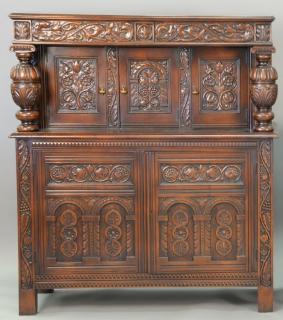 Appraisal: Large carved walnut sunflower style cabinet ht wd Large carved