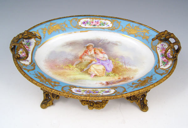 Appraisal: FRENCH LIMOGES METAL MOUNTED DISH Hand painted courting scene with