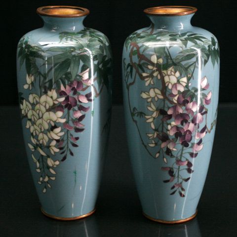 Appraisal: A pair of Japanese cloisonn vases of tapered ovoid form