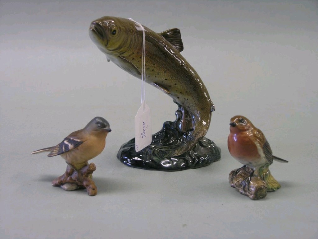 Appraisal: A Beswick fish mould together with two Beswick birds robin