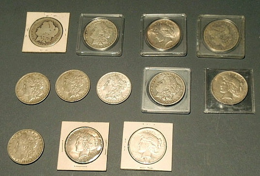 Appraisal: Eight U S Morgan silver dollars- and Peace dollars- two