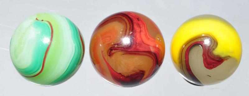 Appraisal: Lot of Akro Agate Oxblood Marbles Description Largest is a