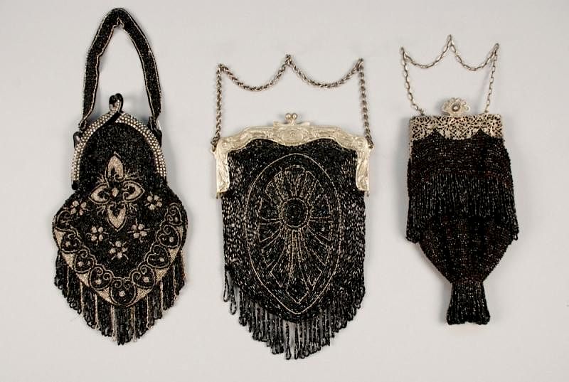 Appraisal: THREE BLACK BEADED BAGS EARLY th C One having celluloid