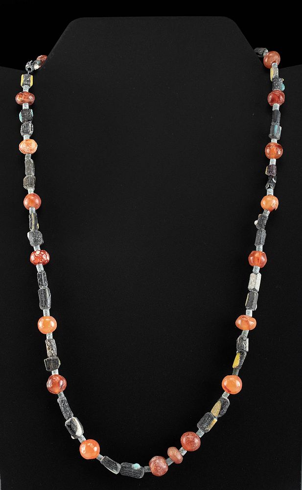 Appraisal: Roman Carnelian Glass Bead Necklace Roman Imperial Period ca st