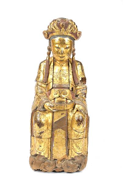 Appraisal: A Chinese gilt lacquered wood seated figure of guanyin th