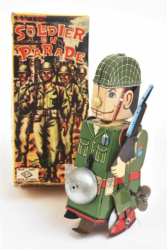 Appraisal: YONEYA TINPLATE MECHANICAL SOLDIER ON PARADE Japanese colourful body permanent