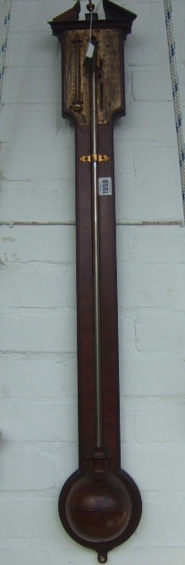 Appraisal: A mahogany stick barometer th century with broken arch pediment