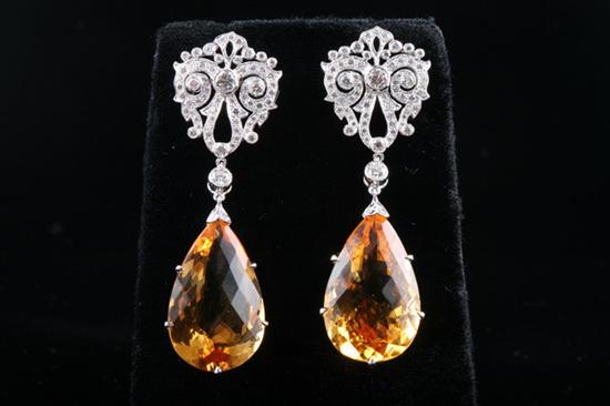 Appraisal: PAIR K WHITE GOLD CITRINE AND DIAMOND DROP EARRINGS Pear-shaped