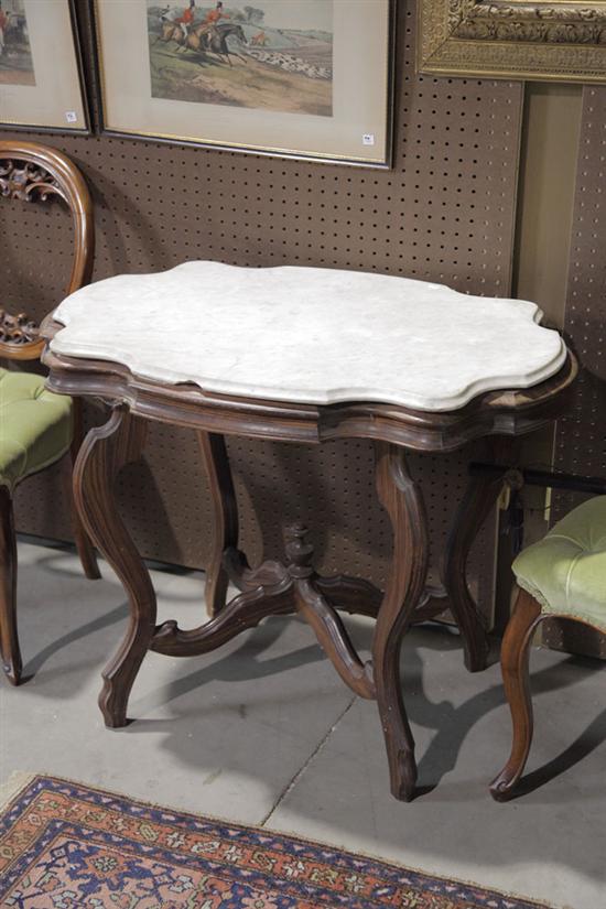 Appraisal: VICTORIAN MARBLE TOP TABLE Walnut having a turtle marble top