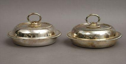 Appraisal: Pair of George III-Style Silverplate Covered Dishes Each in in