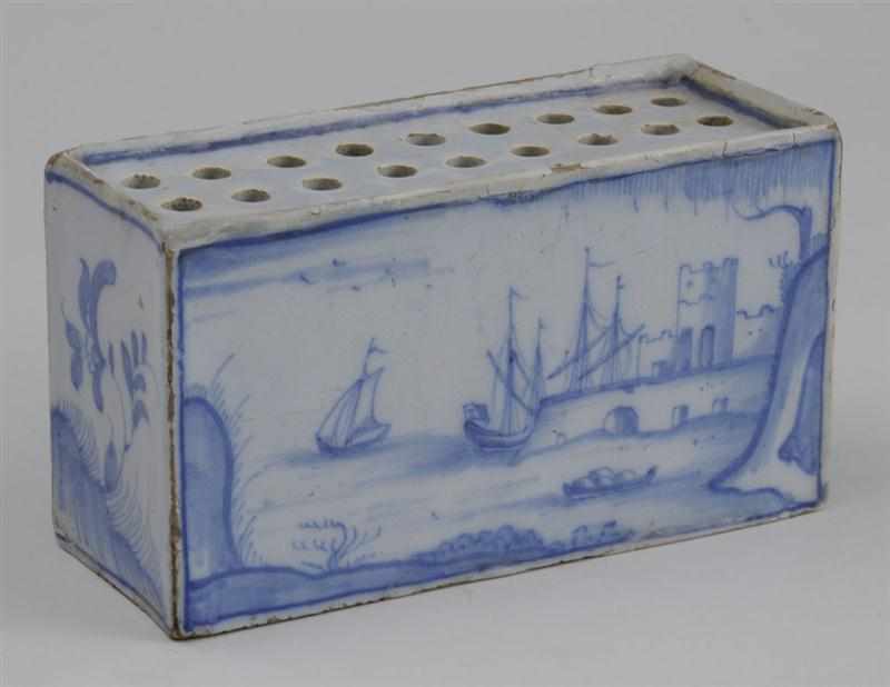 Appraisal: DELFT BLUE AND WHITE FLOWER BRICK With two identical harbor