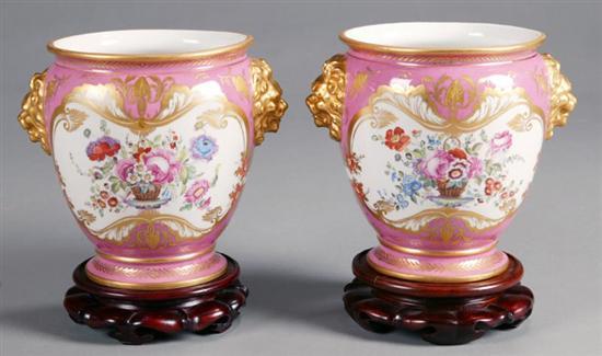 Appraisal: PAIR OF URNS England th century hand decorated porcelain Pink