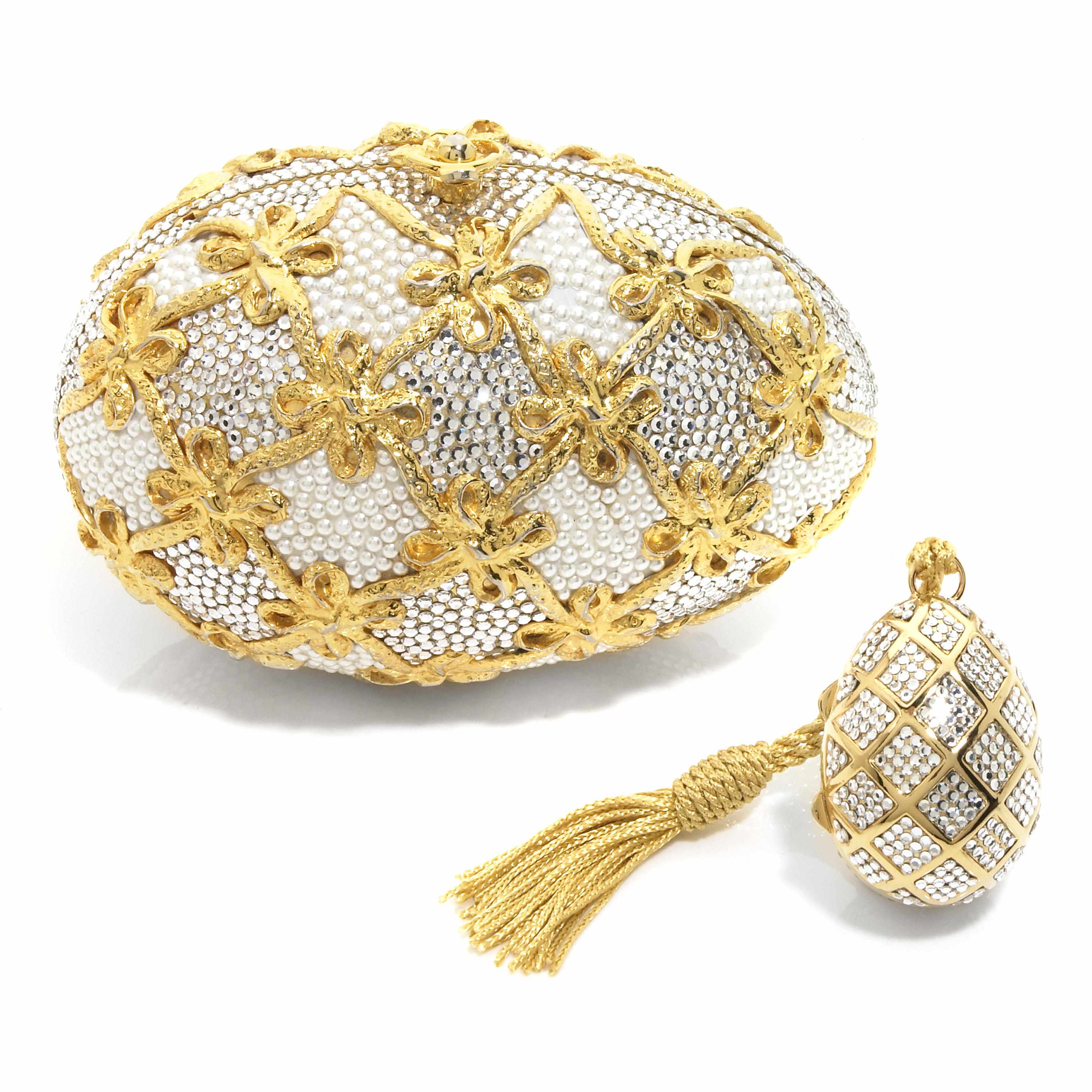 Appraisal: A silver crystal egg purse with gold colored metal bows