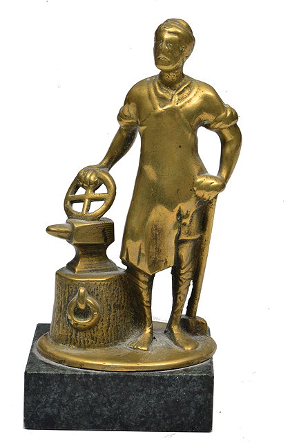 Appraisal: A CAST BRASS VULCAN TRUCK MASCOT cm tall together with