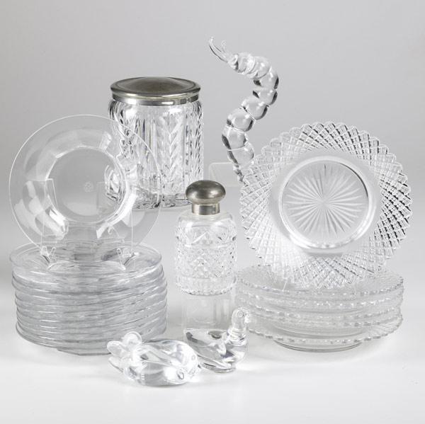 Appraisal: GLASS GROUPING Twenty-three pieces include twelve Baccarat plates Waterford cologne