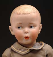 Appraisal: HEUBACH BOY DOLL Darling character doll with blue intaglio eyes